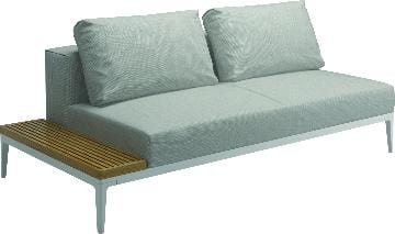 Gloster Lounge modulair Gloster Grid Lounge bank met tafel rechts, verkrijgbaar in 2 verschillende soorten stofferingen en een hele range aan kleuren.