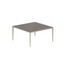 Royal Botania Tafel Gepoedercoat aluminium Pebble / Terra Marrone Royal Botania U-nite Tafel  150x150x75cm. Diverse kleuren frames en tafelbladen mogelijk.