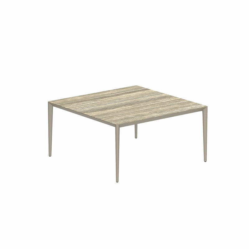 Royal Botania Tafel Gepoedercoat aluminium Sand / Travertino Royal Botania U-nite Tafel  150x150x75cm. Diverse kleuren frames en tafelbladen mogelijk.