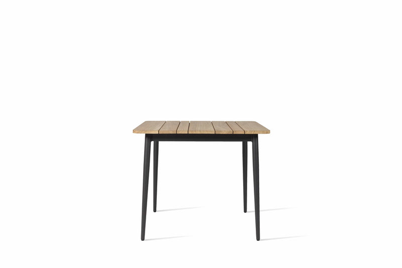 Vincent Sheppard Tafel Teak Vincent Sheppard Leo eettafel 90 x 90. lava kleur frame en teakhouten tafelblad.